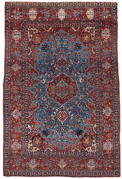 265. A RUG, a semi-antique Esfahan, ca 219 x 140,5-147,5 cm.