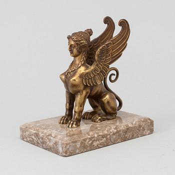 A 19th century bronze and marble paper weight.