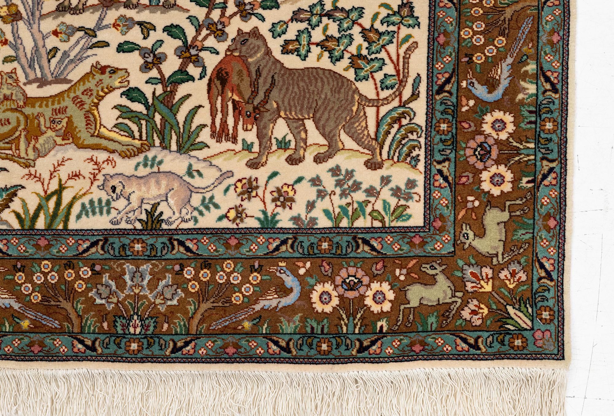 A Tabriz part silk rug, c. 145 x 100 cm.