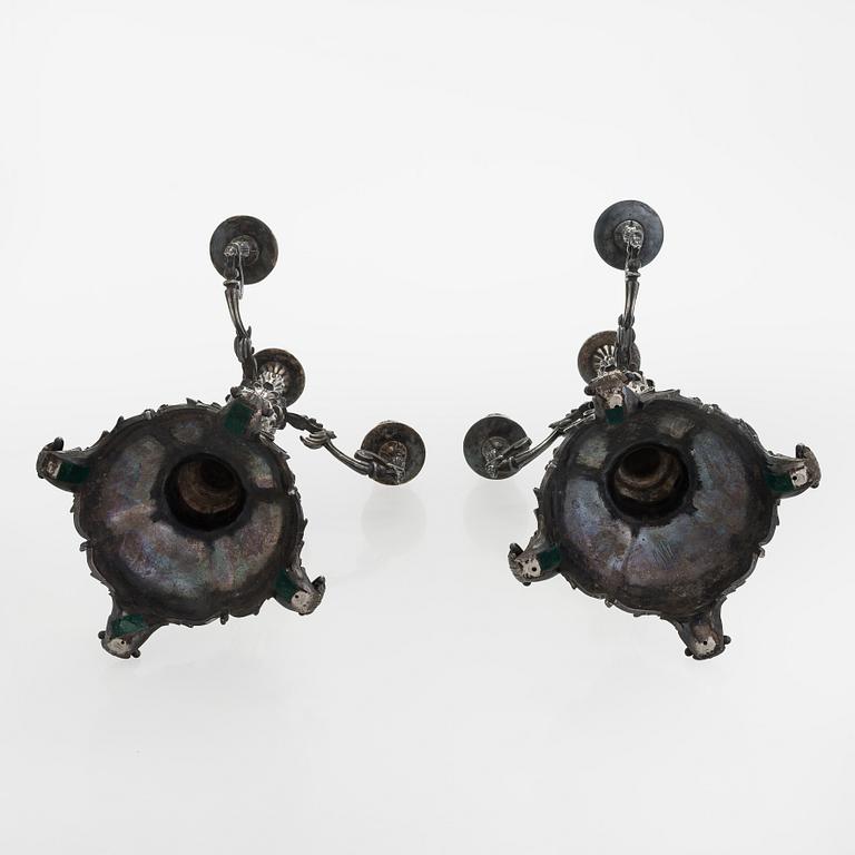 A pair of silver candelabra, maker marks of Carl Johan Tegelsten, Saint Petersburg 1850.