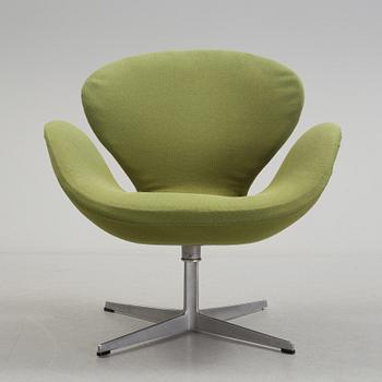 A Arne Jacobsen "Svanen" armchair and stool, second half of the 20th century.