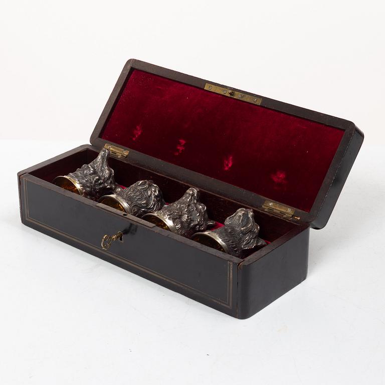 Six Russian parcel-gilt silver animal's head stirrup cups, including with mark of Nikols & Plinke, St. Petersburg.