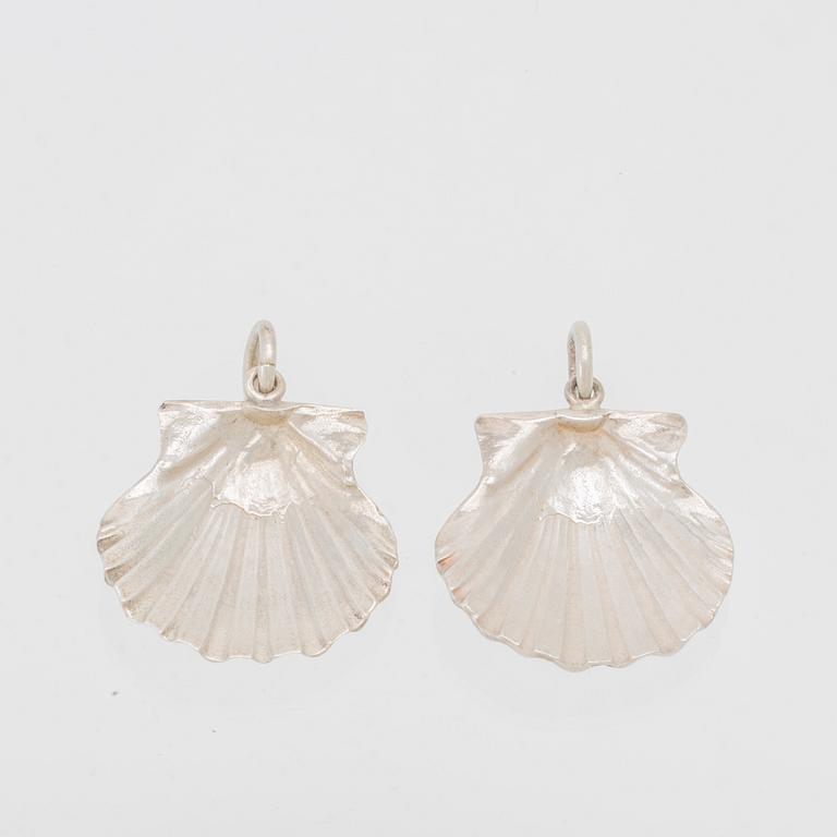 A pair of silver Pilgrim Shell pendants by Berit Johansson, W&A Sävsjö Goldsmith.