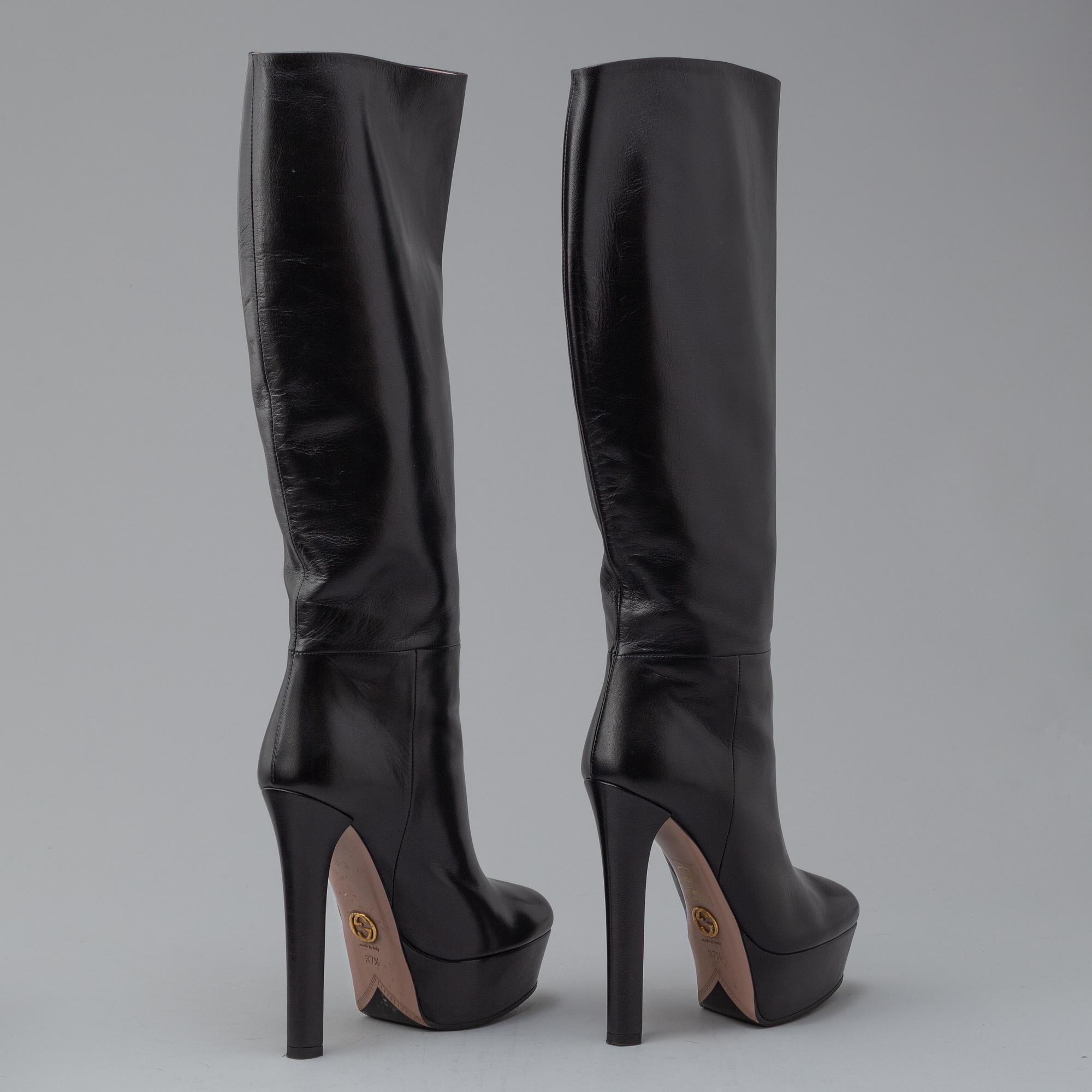 GUCCI, a pair of platform, high heel leather boots, size 37½.