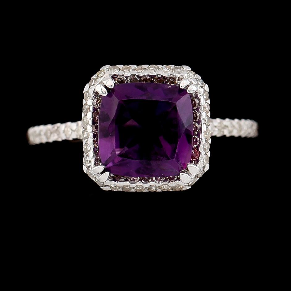 RING, 14K vitguld, ametist samt diamanter tot ca 0.50 ct.