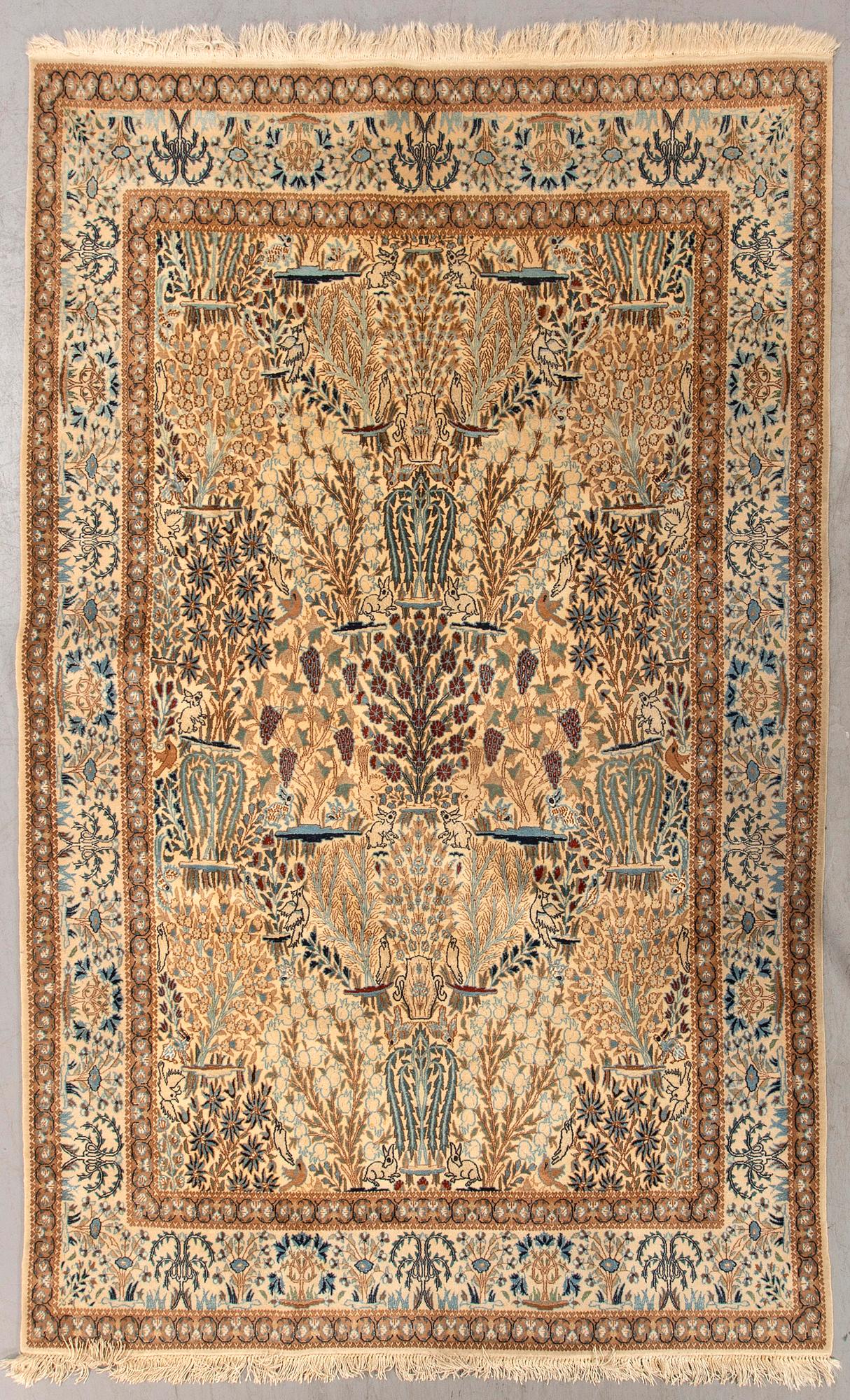 A semiantique part silk nain carpet ca 265 x 163 cm.