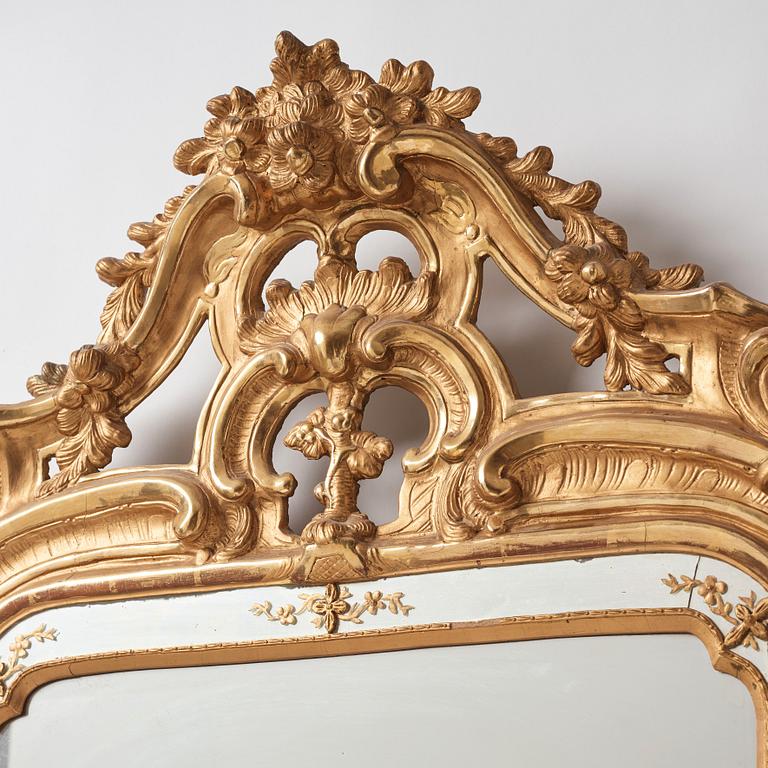 A Swedish Rococo 18th century two-light mirror/girandol mirror.