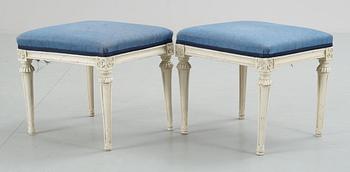 423. A pair of late 18th century Gustavian stools.