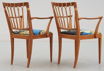 A pair of Josef Frank mahogany and rattan armchairs, Svenskt Tenn, model 1165.