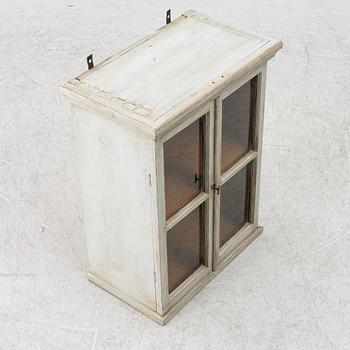 A wall cabinet, late 19th Century.