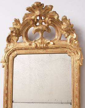 A rococo giltwood mirror by J. Åkerblad (master in Stockholm 1758-99).