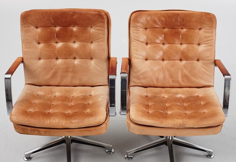 Kenneth Bergenblad, a pair of leather upholstered armchairs from Dux, designed 1978.