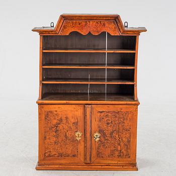 A late Baroque burr alder-veneered cabinet, first part of the 18th Century.