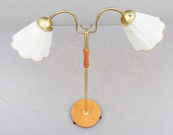 GOLVLAMPA, Pagos, 1900-talets mitt.