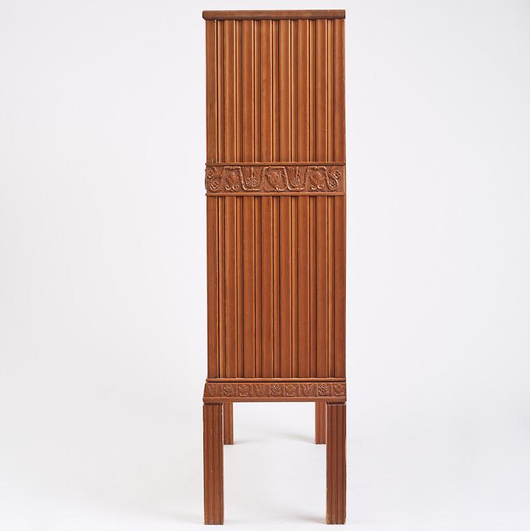 A Swedish Modern stained pine cabinet, 1940s.