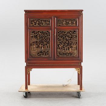 A bar cabinet, purchased in Tokyo around the 1950s. Partly built by late Qing dynasty panels.