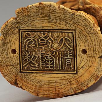 A carved ivory figure of one of the immortals, China presumably early 20th century.