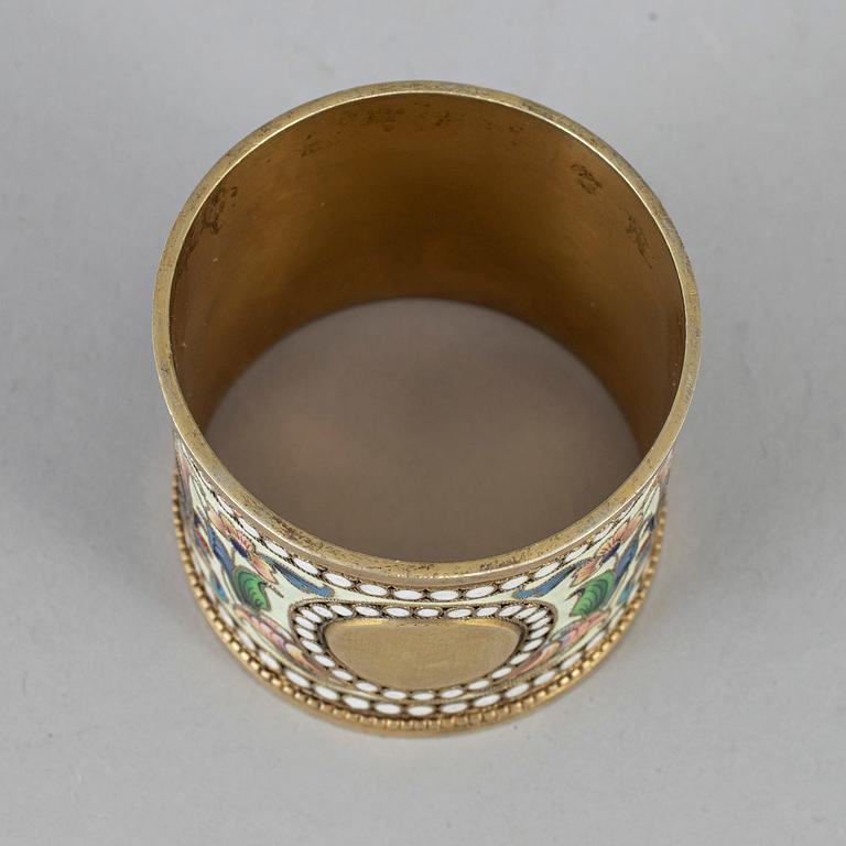 A Russian silver-gilt and cloisonné enamel napkin ring, unidentified makers mark, Moscow 1899-1908.