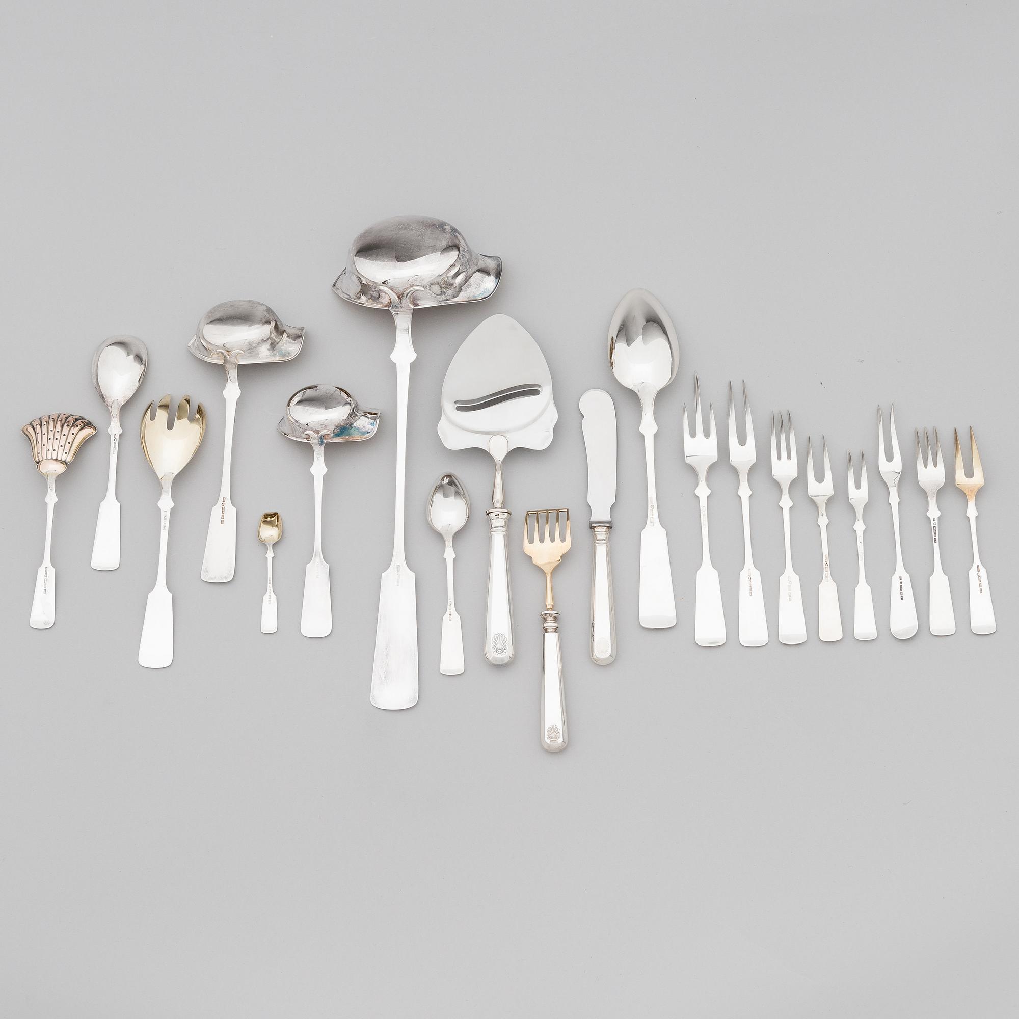 A 42-piece set of silver cutlery with seashell decorated handles, Finnish hallmarks, 1918-1950.