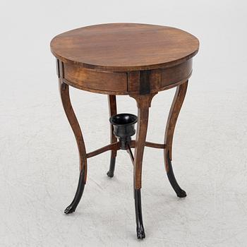An Empire table, northern Europe, early 19th century.
