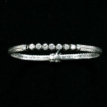 A BRACELET, 9 brilliant cut diamonds c. 0.90 ct.