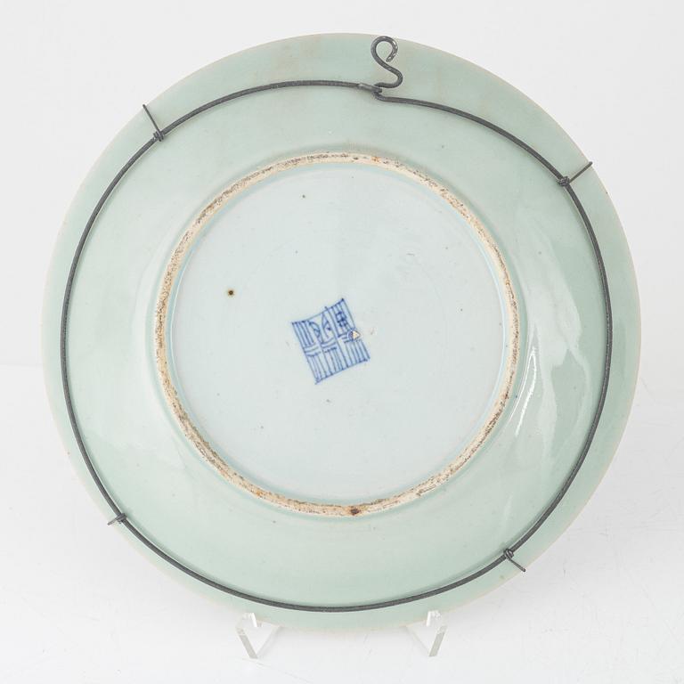 A Kanton porcelain dish and two porcelain plates, China, 19th century.