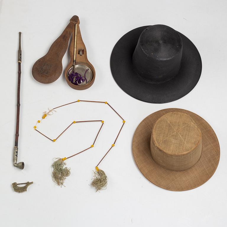 A Korean wooden wedding chest, two hats, an opium pipe, a scale, circa 1900.