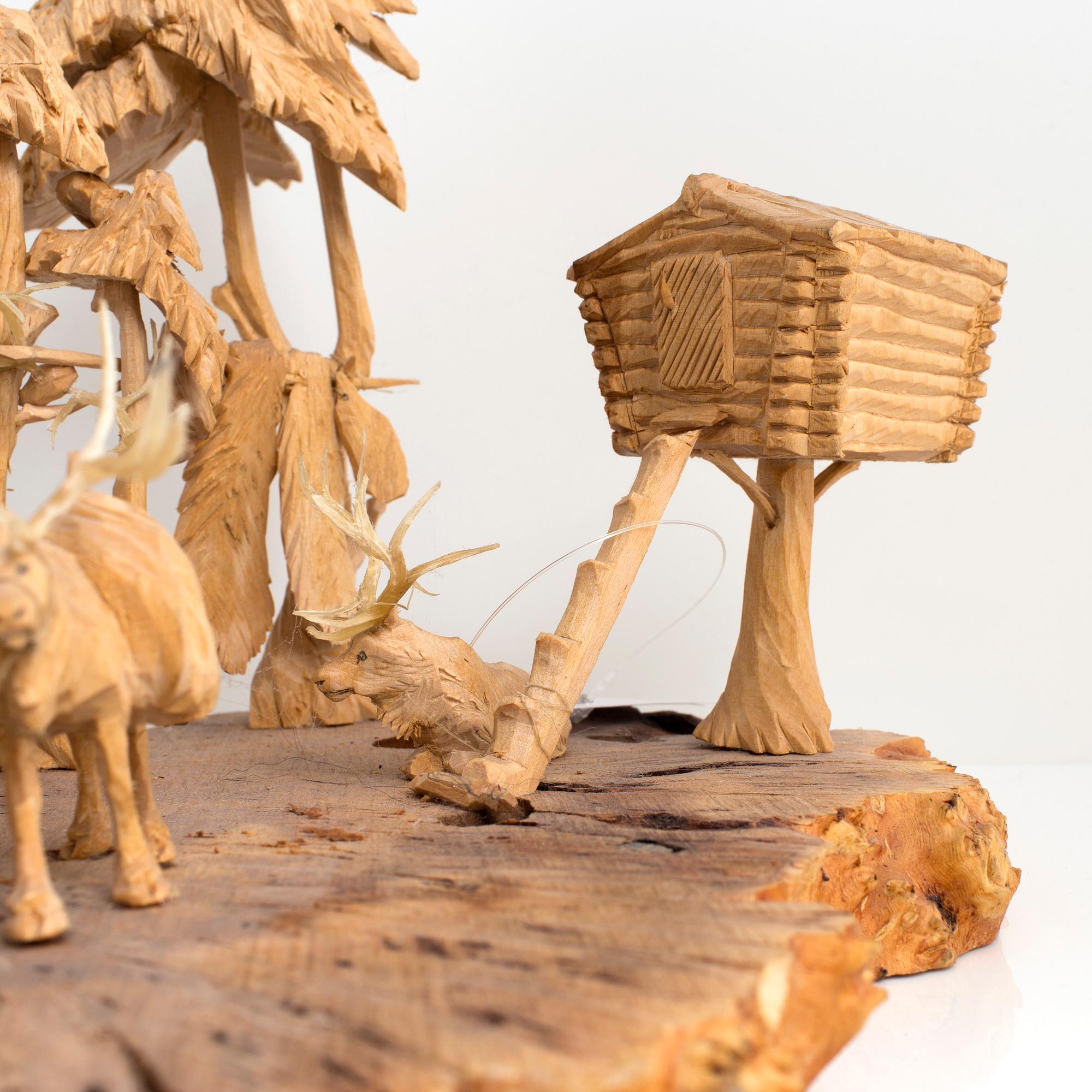 MARTIN STENSTRÖM, Jutsajaure, skulpturgrupp, snidat trä, signerad M.S. och daterad Jutsajaure 1987.