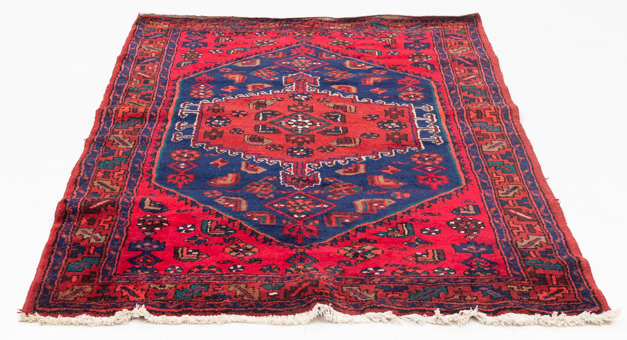 A carpet, circa 201 x 134 cm.