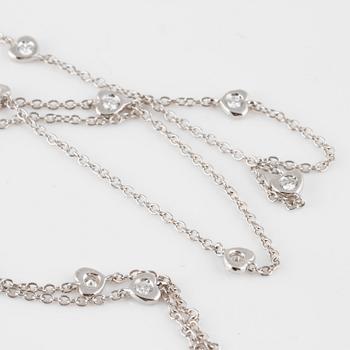 COLLIER, 18K vitguld med 10 briljantslipade diamanter ca 0.25 ct. Vikt 3,3 gram.