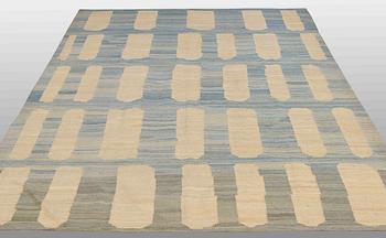 A flatweave rug, 285 x 222 cm.
