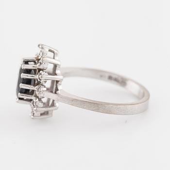 A sapphire and brilliant cut diamond ring with Swedish hallmark.