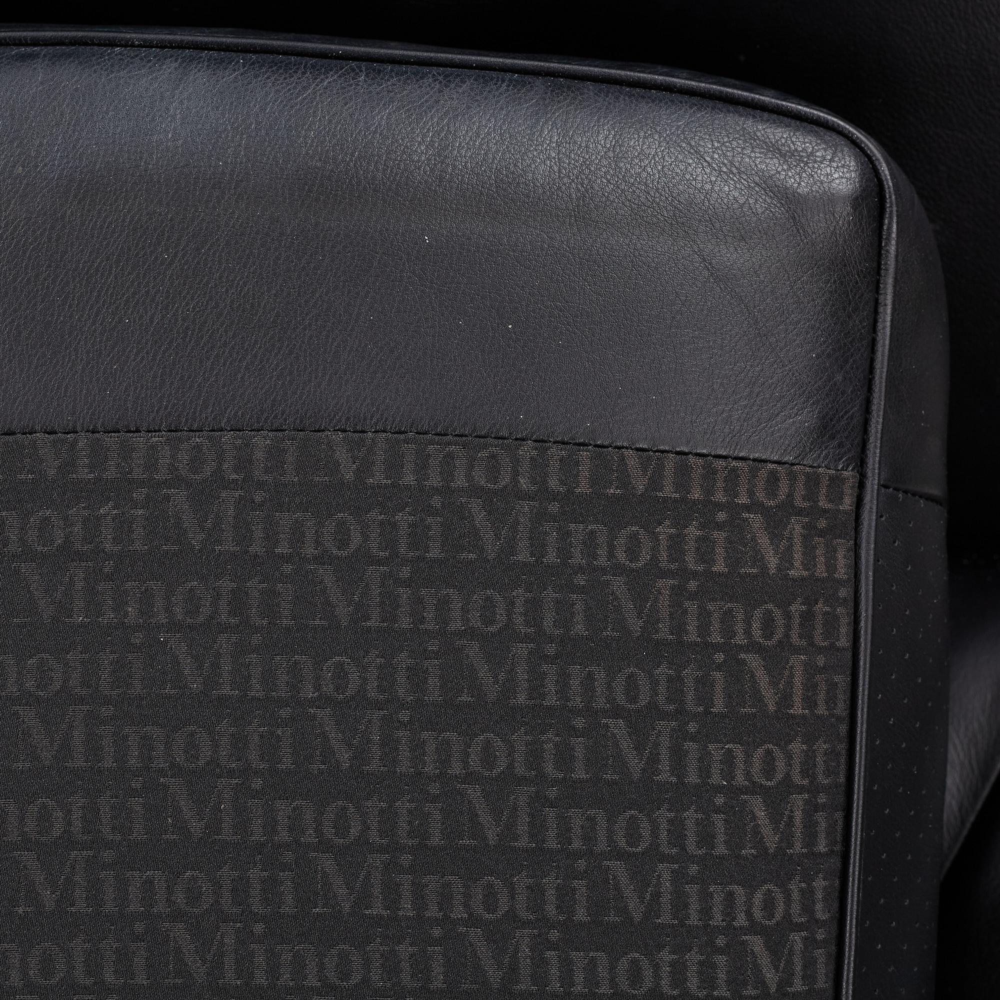 Rodolfo Dordoni, a 'Blake Soft' armchair with ottoman, Minotti, Italy.