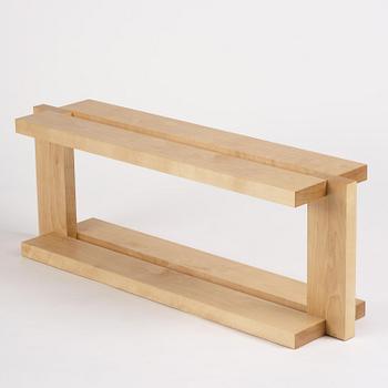 Nick Ross, an "Arrangement #16" coffe table/bench, executed in his studio, Stockholm, 2024.