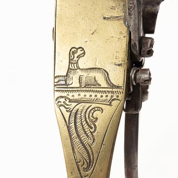 A Northern European flintlock lighter, mid 18th century.