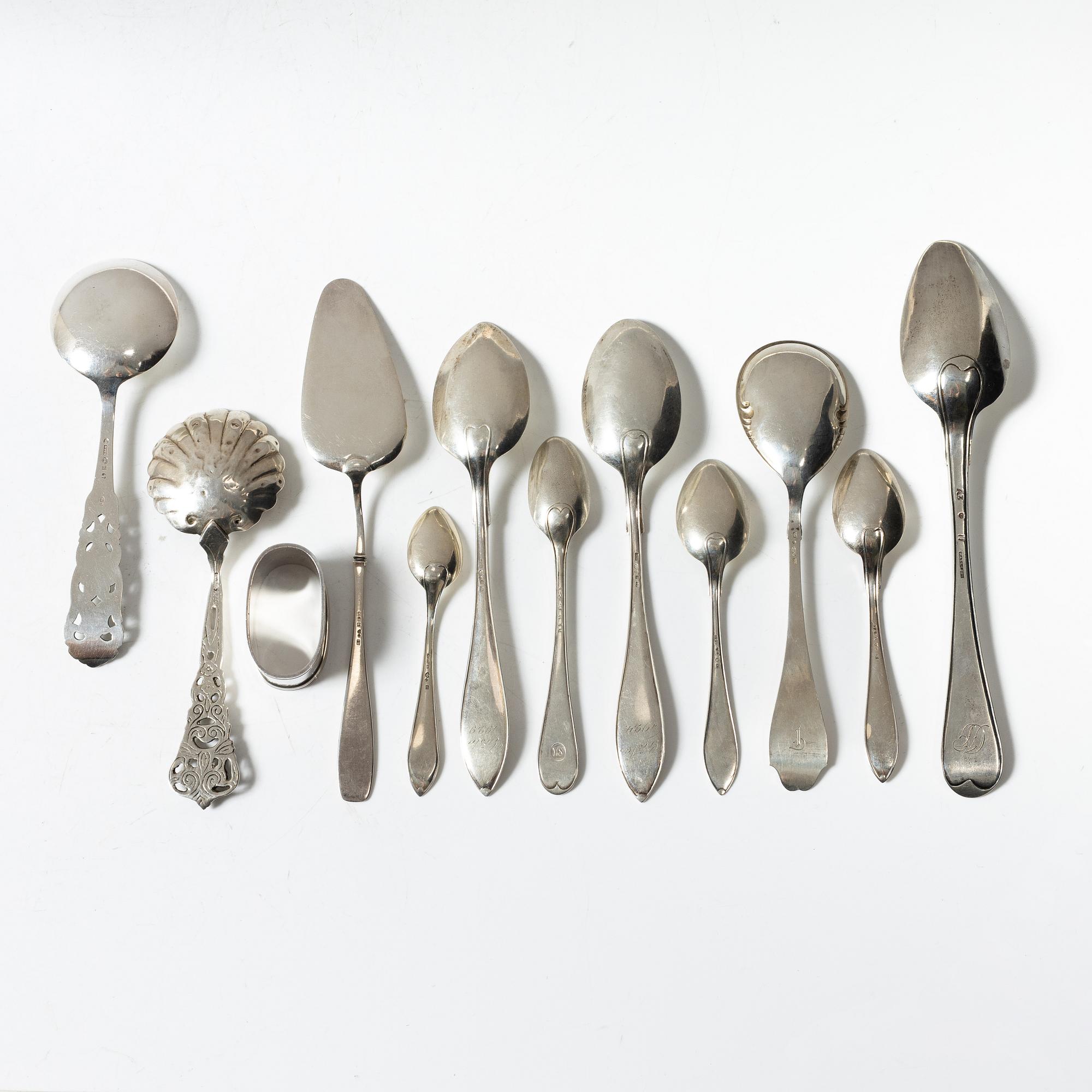 21 pieces of silver cutlery, 1807 - mid 20th century.