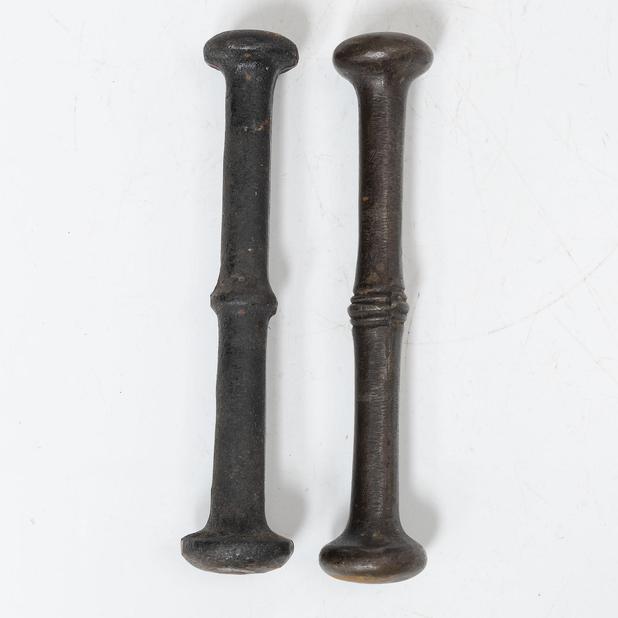 A set of two renaissance-type cast-iron mortars, 17th century.