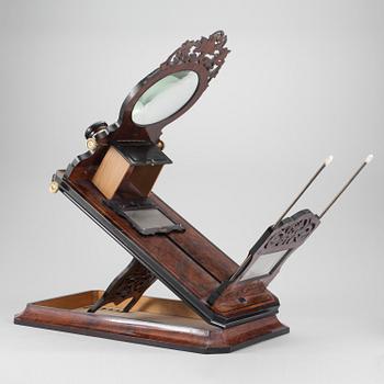 A table mounted stereoscope ca 1900.