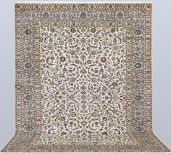 A Keshan carpet, signed, approx. 368 x 270 cm.