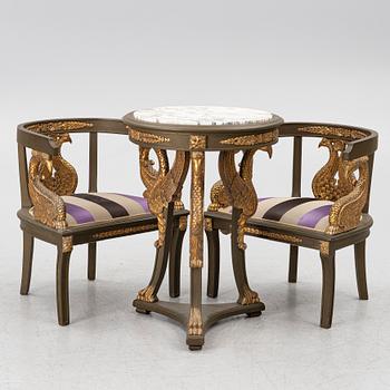 A pair of Empire-style armchairs with an end table, second half of the 20th century.