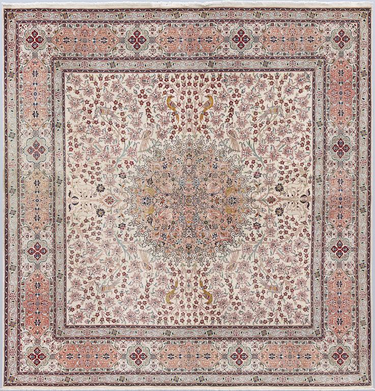 A figural Tabriz carpet, part silk, so-called 50 Raj, approx. 210 x 200 cm.