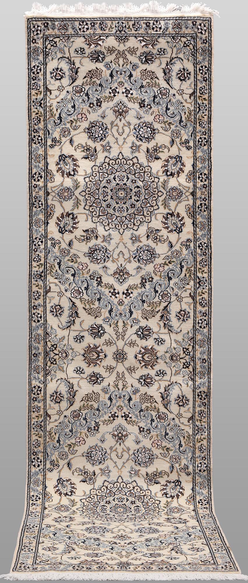 A Nain part silk runner carpet, 311 x 88 cm.