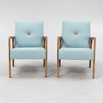 a pair of 1950's armchairs.