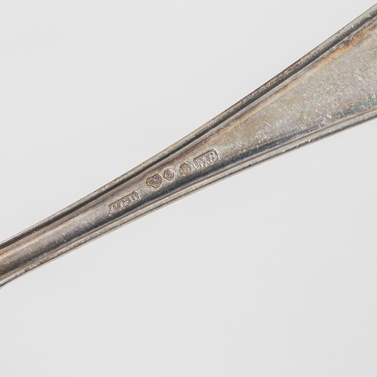 A set of silver cutlery and napkin rings, including with mark of Th Marthinsen, Tönsberg, Norway (14 pieces).