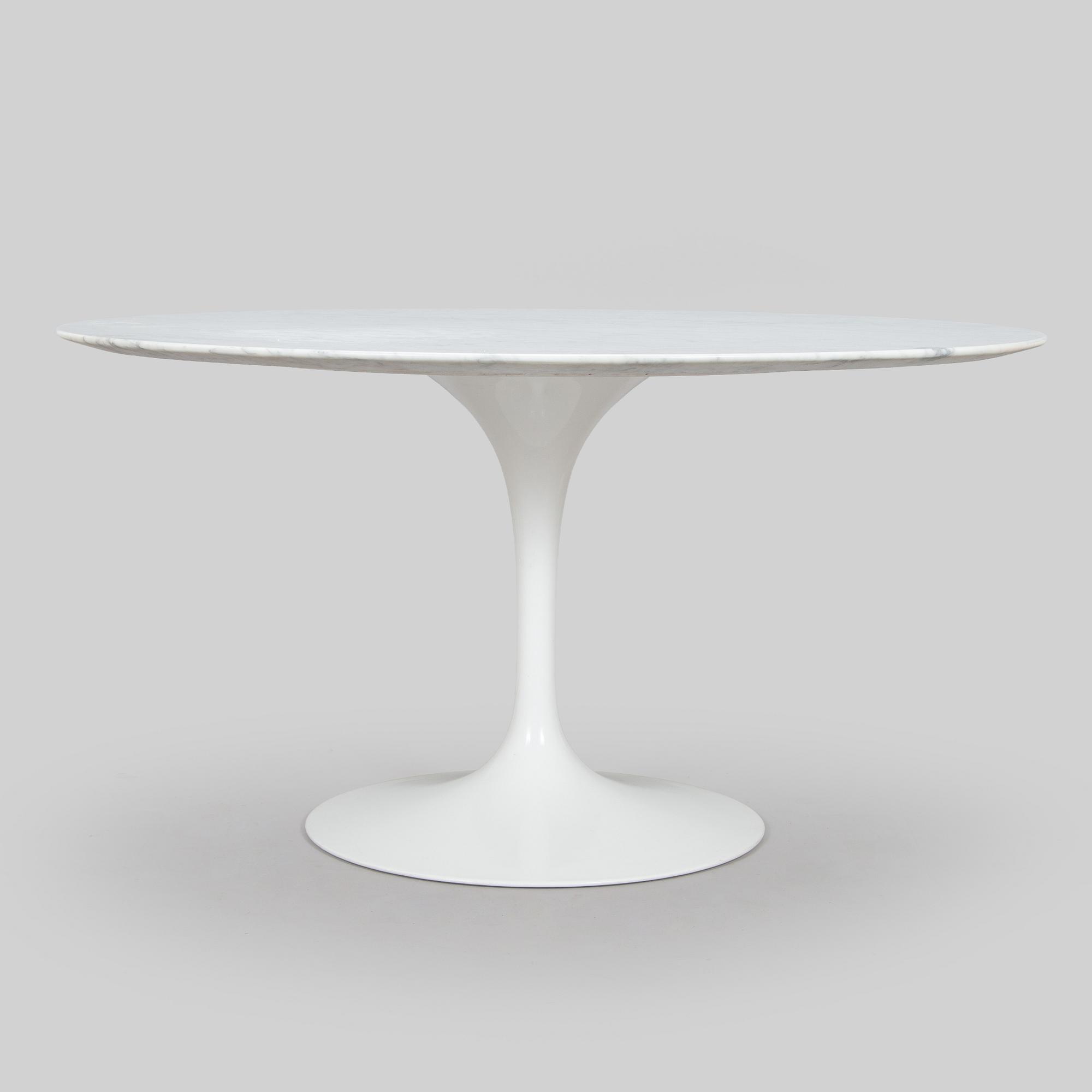 Eero Saarinen, A 'Tulip' furniture set, table with eight chairs, Knoll International, 1970s.