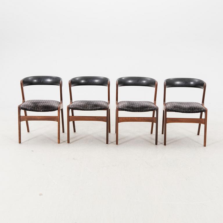 Kai Kristiansen, a set of four walnut chairs mid 1900s.