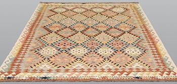 A Kilim rug, c. 249 x 169 cm.