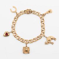 Bracelet 18K gold bismarck link, with charms.