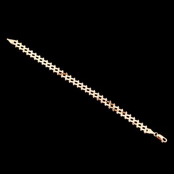 ARMBAND, 18 k guld. Vikt ca 9 gram.