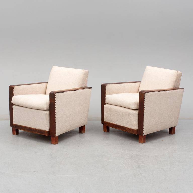 A 1930's pair of model 184 easy chairs by Björn Trägårdh, Firma Svenskt Tenn.